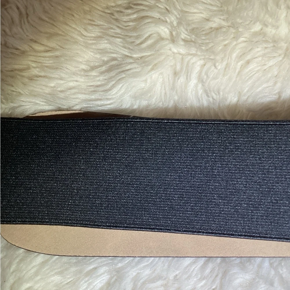 Chico’s black elastic faux leather belt size large